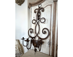 Candelabro da parete in ferro battuto