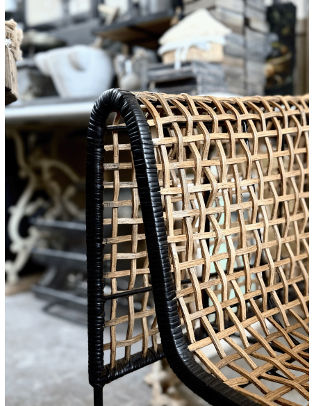 Poltrona in rattan intrecciato e ferro