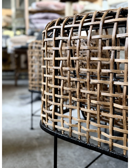 Poltrona in rattan intrecciato e ferro