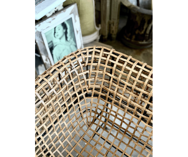 Poltrona in rattan intrecciato e ferro