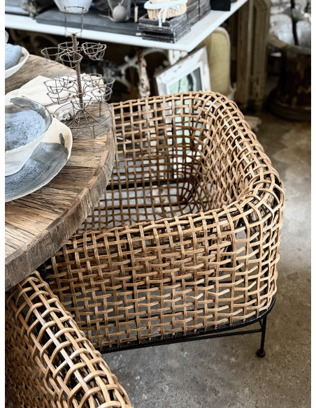 Poltrona in rattan intrecciato e ferro